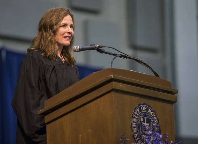 
			
				                                FILE - In this May 19, 2018, file photo, Amy Coney Barrett, United States Court of Appeals for the Seventh Circuit judge, speaks during the University of Notre Dame’s Law School commencement ceremony at the university, in South Bend, Ind. Barrett, a front-runner to fill the Supreme Court seat vacated by the death of Justice Ruth Bader Ginsburg, has established herself as a reliable conservative on hot-button legal issues from abortion to gun control. (Robert Franklin/South Bend Tribune via AP, File)
 
			
		