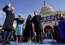 
			
				                                Joe Biden is sworn in as the 46th president of the United States by Chief Justice John Roberts as Jill Biden holds the Bible during the 59th Presidential Inauguration at the U.S. Capitol in Washington, Wednesday, Jan. 20, 2021, as their children Ashley and Hunter watch.(AP Photo/Andrew Harnik, Pool)
 
			
		