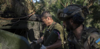 
			
				                                Ukrainian soldiers load a howitzer with a shell on the front line in the outskirts of Lyman, Ukraine last month. Moscow’s army is staging a ferocious push in northeast Ukraine designed to distract Ukrainian forces from their counteroffensive and minimize the number of troops Kyiv is able to send to more important battles in the south.
                                 AP photo

			
		